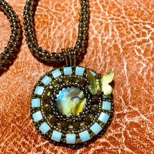 Beaded pendant with rope